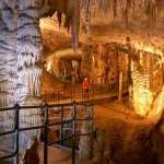 A visitor in the Postojna cave fda
